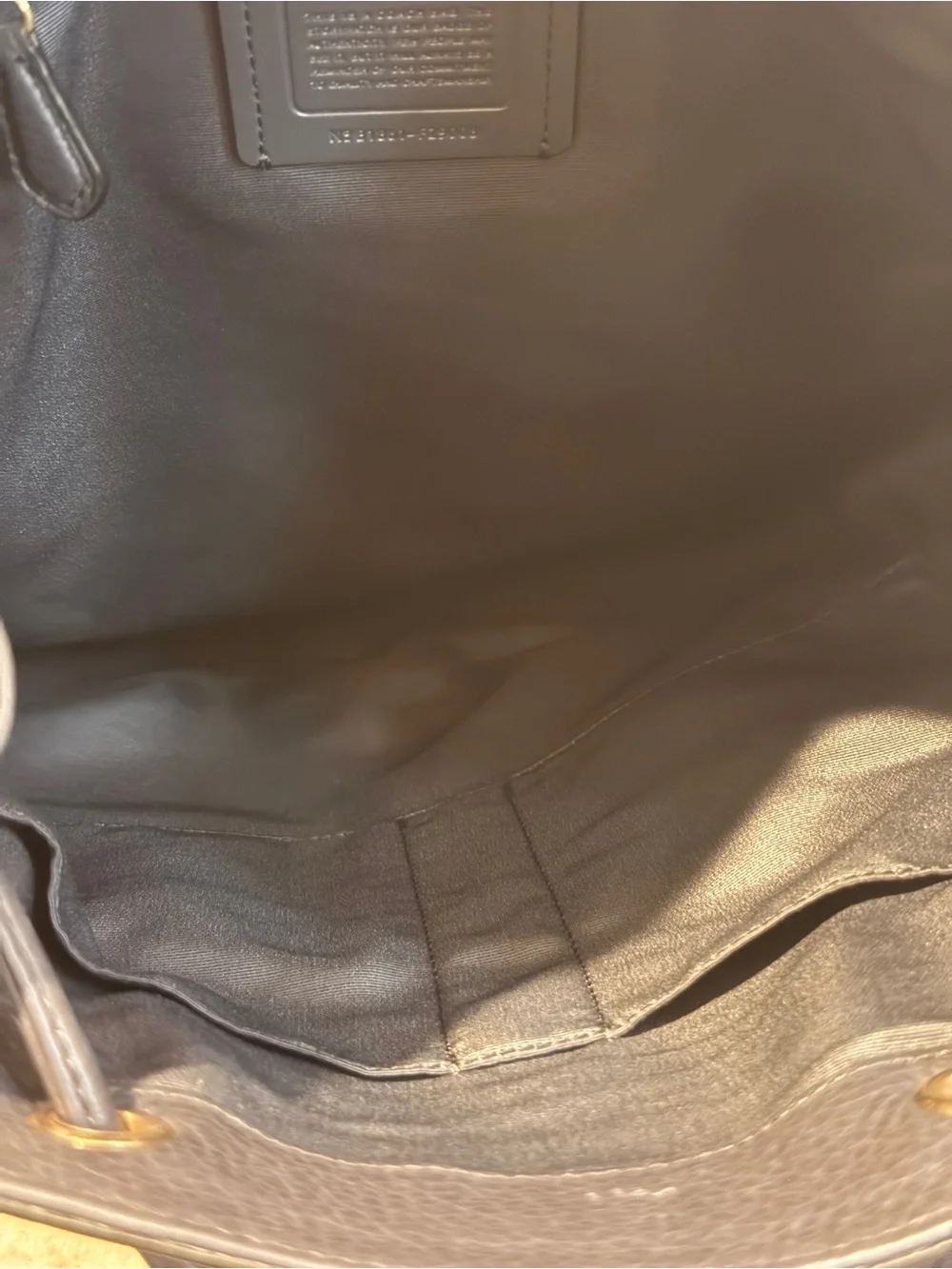 COACH Black Pebbled Leather Drawstring Backpack with Front Pockets